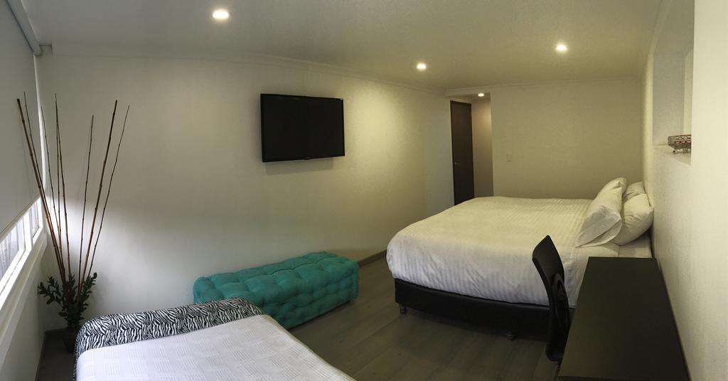 Hotel Metro 26 Богота Стая снимка